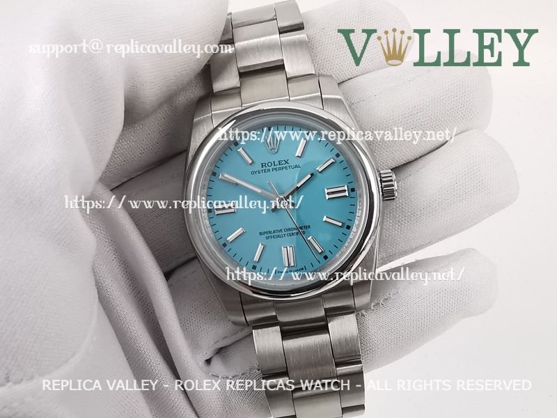 3dee7e5bc82dd3290f65b0503b66ec07e18bbc08 OP36004 Rolex Oyster Perpetual 126000 Turquoise Blue Dial - Image 1